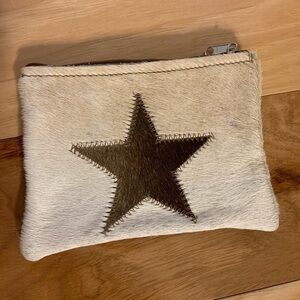 Cowhide and suede zippered pouch with star